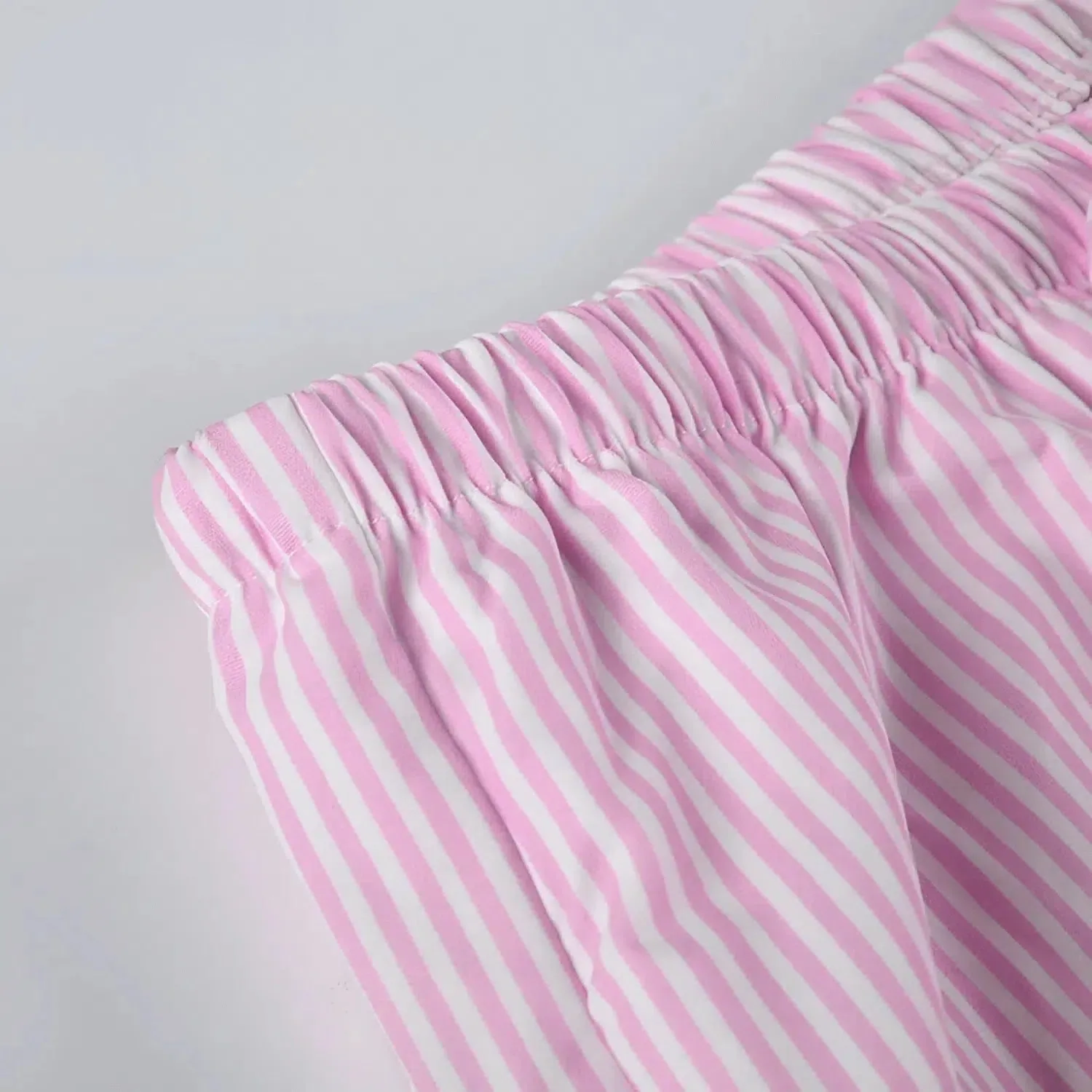 Zinara – Front tie detail – Stripe trousers