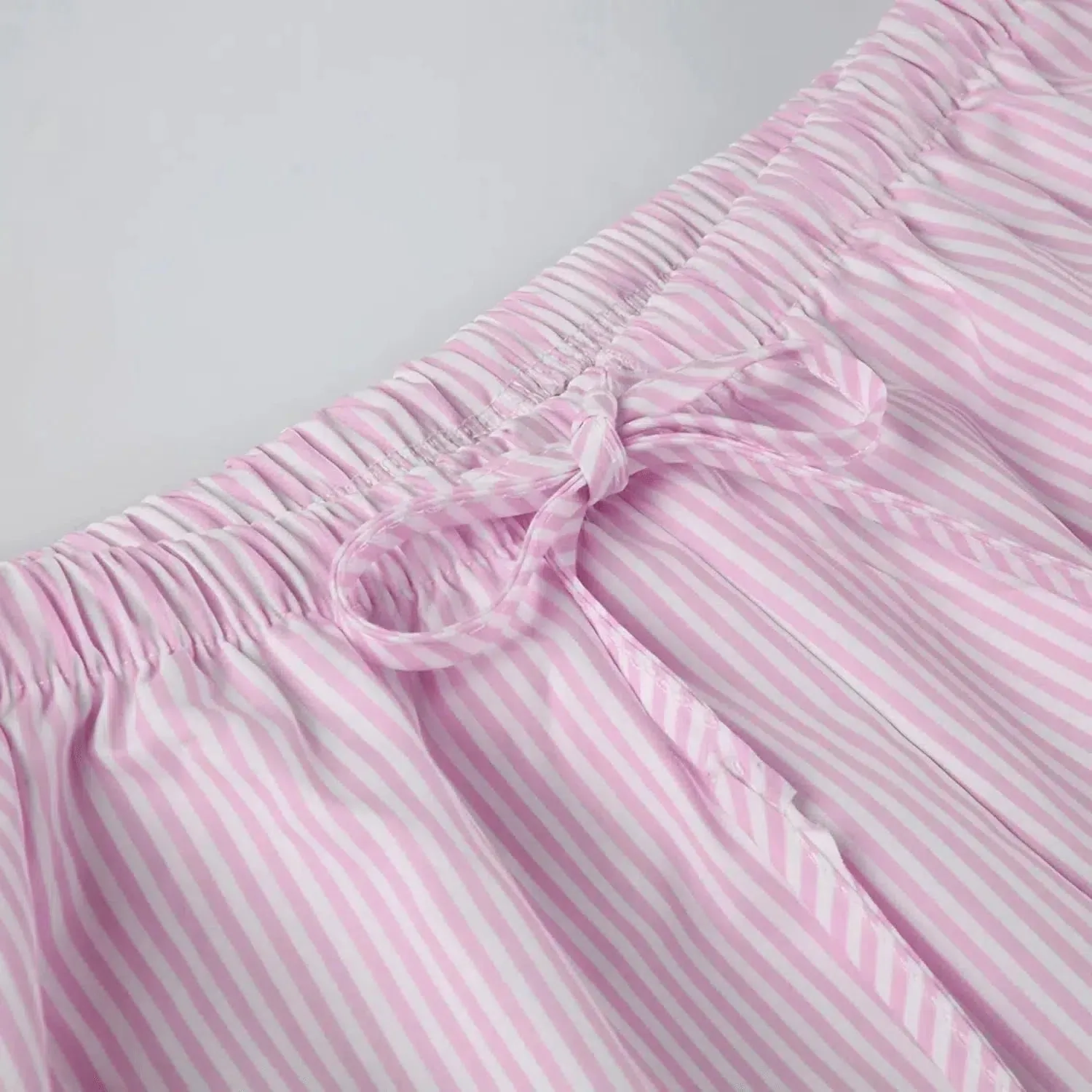 Zinara – Front tie detail – Stripe trousers